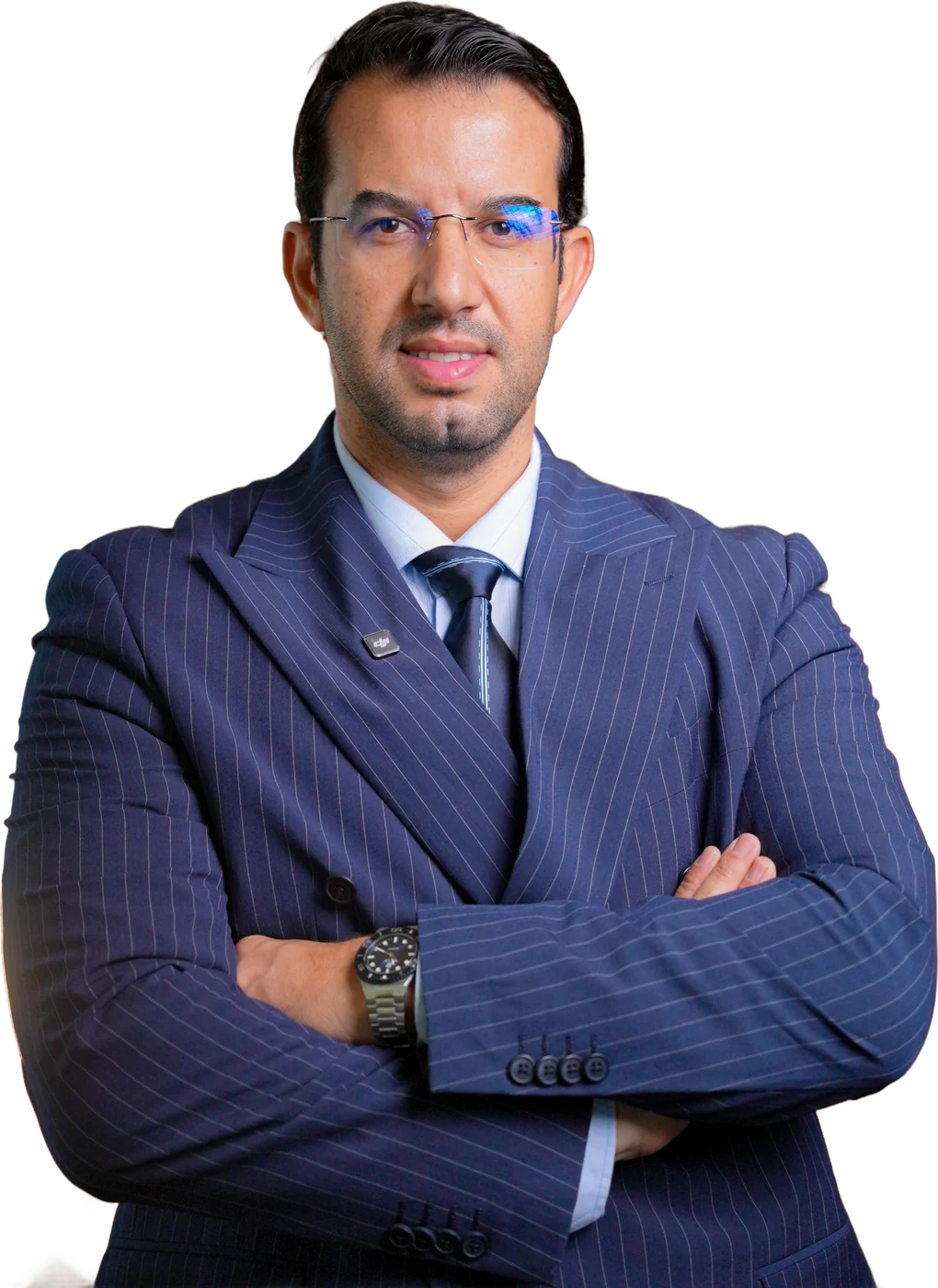 Dr CHARRASS Abdelmajid, costume bleu marine à rayures, bras croisés
